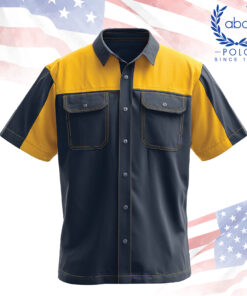 เสื้อช็อปแขนสั้น ทูโทนสีน้ำเงินเข้มตัดเหลือง พร้อมกระเป๋าเสื้อสองข้างทรงเหลี่ยม ฝาปิดกระดุม ดีไซน์เรียบหรู เน้นความเป็นมืออาชีพ เหมาะกับงานภาคสนาม