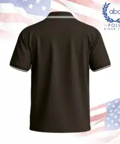 เสื้อโปโลพนักงานสีดำมีขลิบขาวที่ปกและปลายแขนเสื้อ แขนสั้น ปุ่มกระดุมสองเม็ด ภาพที่ 2